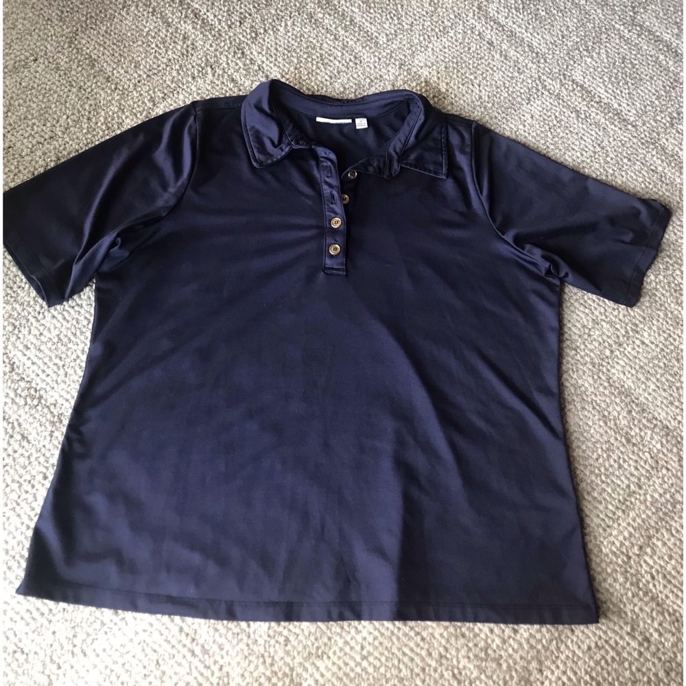 A navy blue shirt, with golden buttons.💙💙